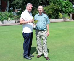 Lawrence Cross (sponsor) presents Bill Hackett with his Over 75's Trophy